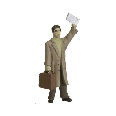 Figurine homme avec valise et journal