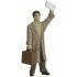 Figurine homme avec valise et journal