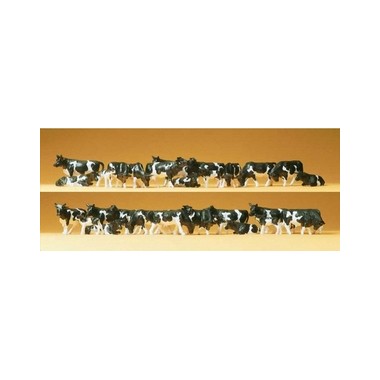 Figurines Vaches blanches et noires