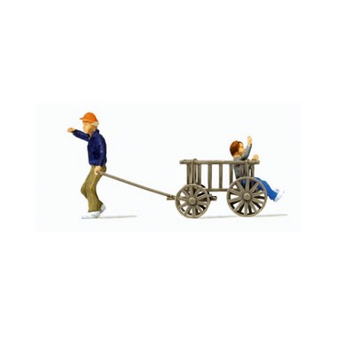 Figurine Enfant dans une charrette