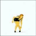 Figurine Femme aux chaussures inconfortables